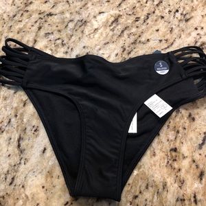 strappy, cheeky black bottoms